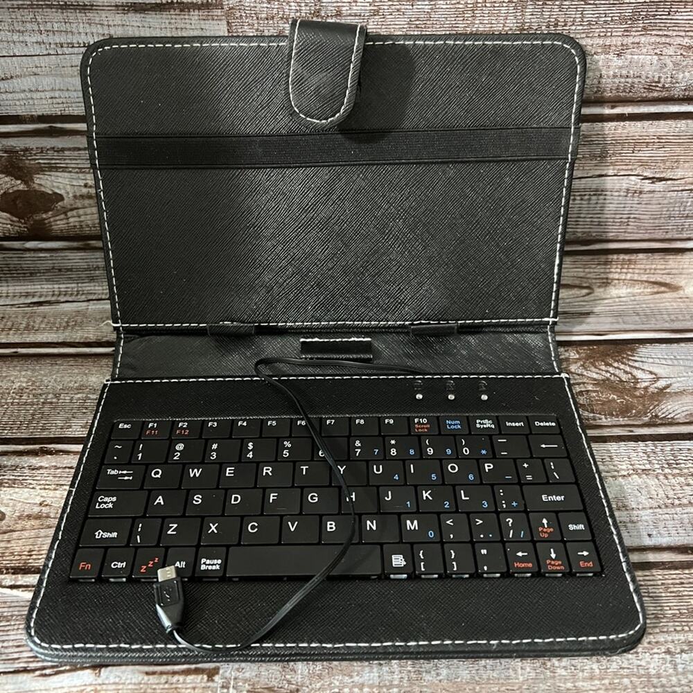 Tablet case and Keyboard. Can hold up to a 9” tablet.